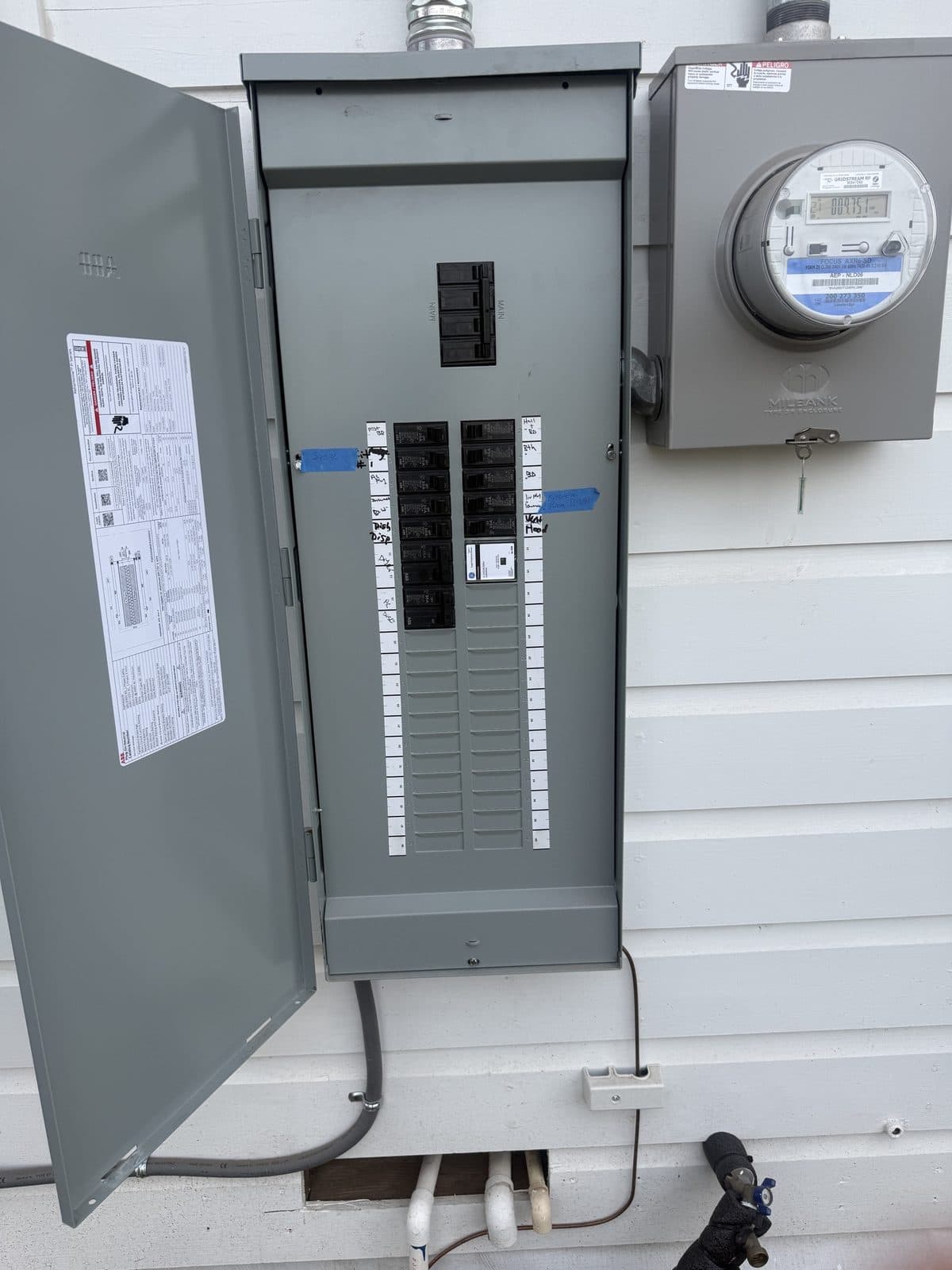 Open electrical panel inspected by Trinity Service Pros
